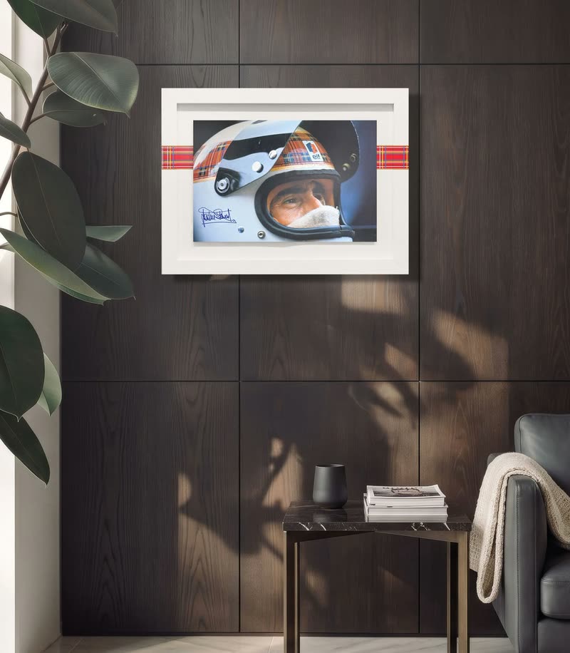 The Jackie-signed edition on a dark wood wall