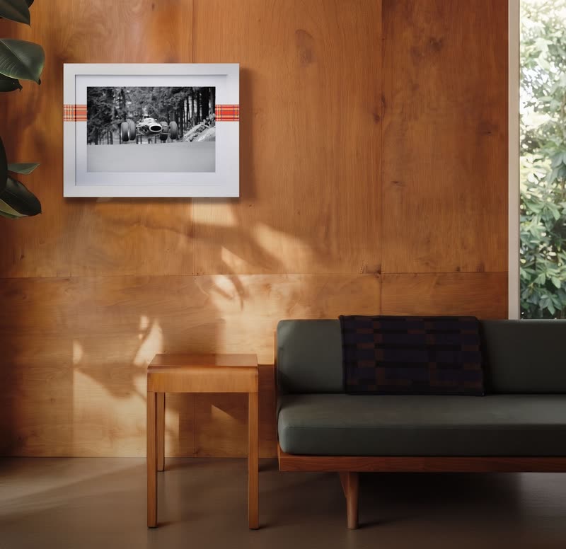The Circle Edition framed on a wood-panelled wall