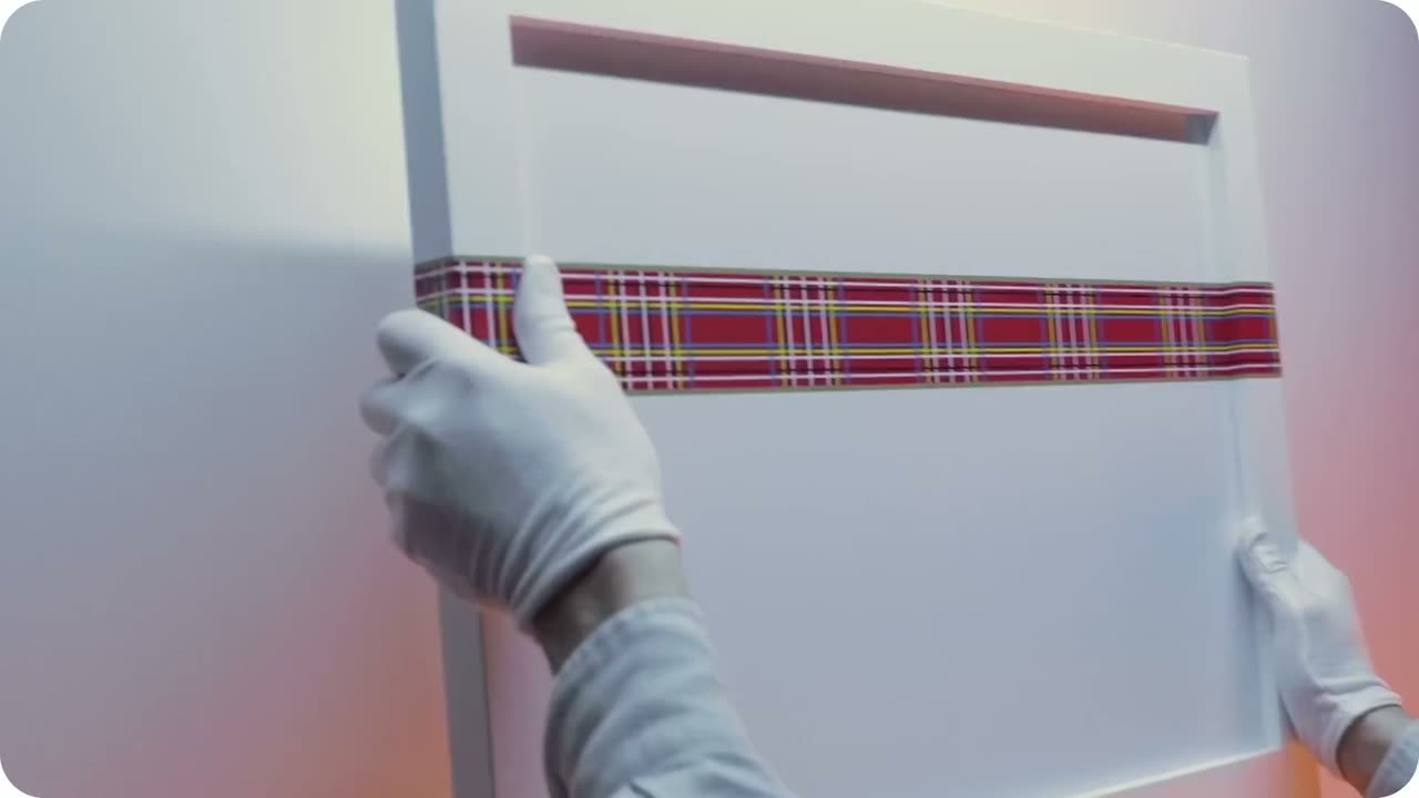 Mounting a Jackie Stewart Framebook on a gallery wall